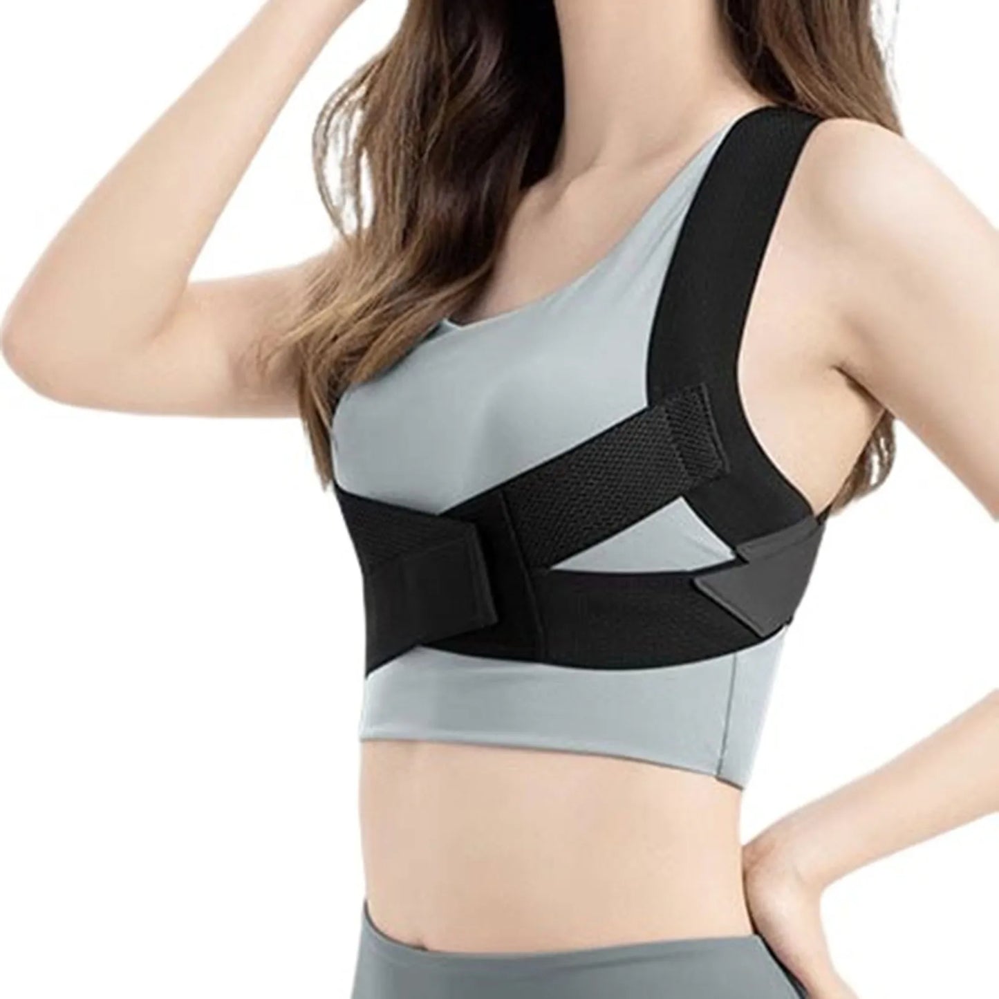 Adjustable back posture corrector brace supporting upper spine and straightening the back for improved posture.