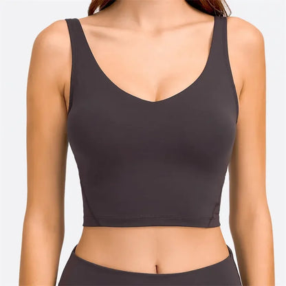 Nepoagym Passion tank top with built-in shelf bra, removable padding, longline design, ideal for yoga and gym workouts.