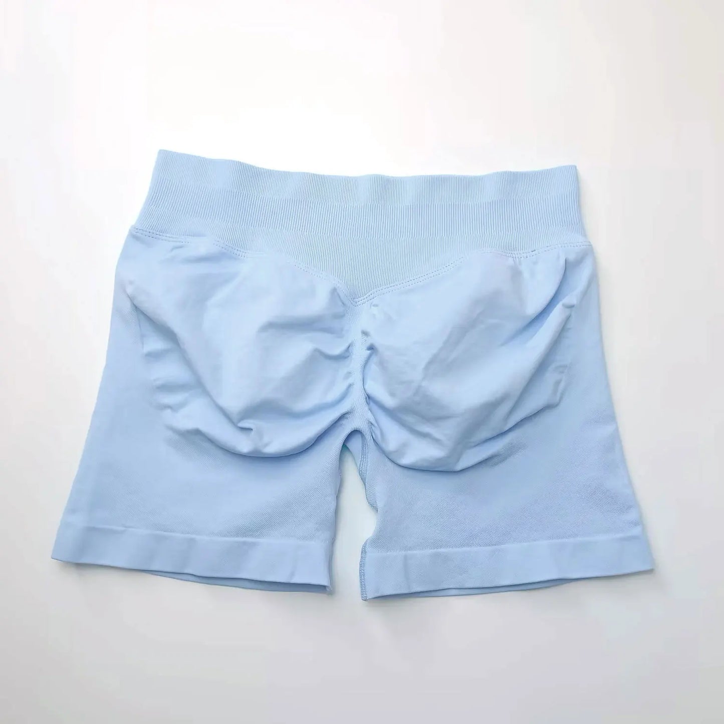 NCLAGEN seamless 4.5-inch gym shorts for women, featuring scrunch butt design, ideal for running, yoga, and fitness workouts.