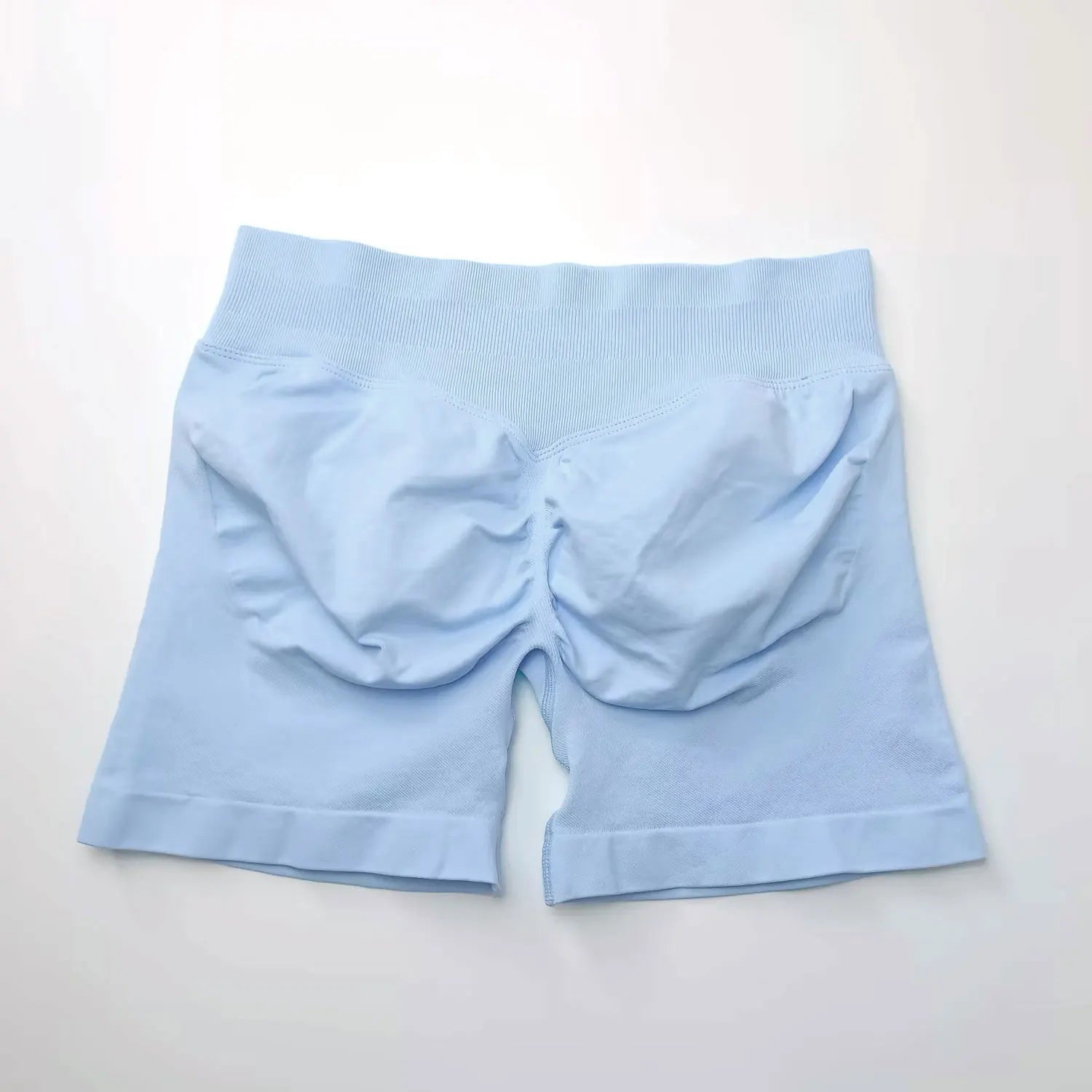 NCLAGEN seamless 4.5-inch gym shorts for women, featuring scrunch butt design, ideal for running, yoga, and fitness workouts.