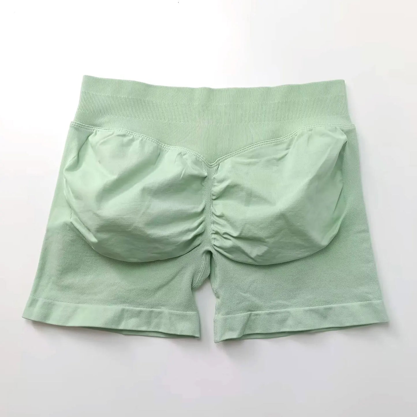 NCLAGEN seamless gym shorts for women, 4.5-inch length, scrunch butt design, ideal for running, yoga, and fitness workouts.