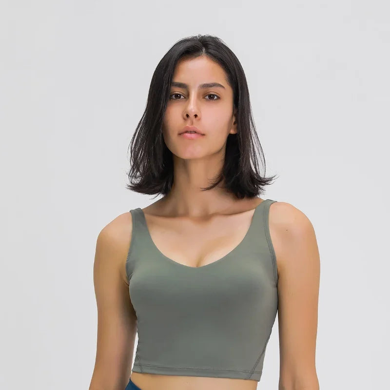 Nepoagym PASSION tank top with built-in shelf bra, removable padding, longline design, ideal for yoga and gym workouts.