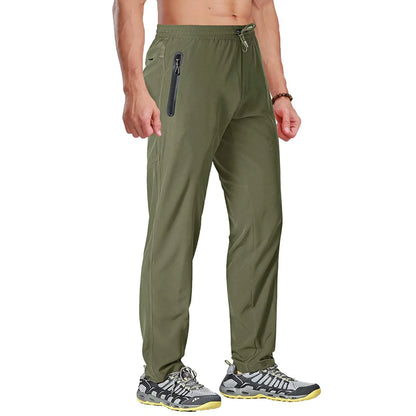 TACVASEN men's outdoor quick-dry hiking pants with elastic waistband, straight fit, lightweight fabric, suitable for running and fitness activities.
