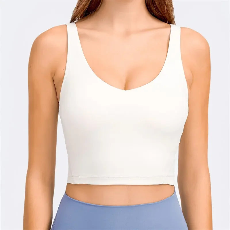 Nepoagym Passion tank top with built-in shelf bra, removable padding, longline design, perfect for yoga and gym workouts.