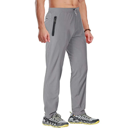 TACVASEN men's outdoor pants showing quick-dry, lightweight hiking and running joggers with elastic waistband and straight fit.