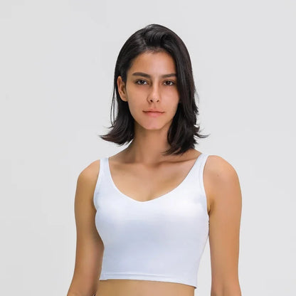Nepoagym PASSION tank top with built-in shelf bra, removable padding, longline design, ideal for yoga and gym workouts.