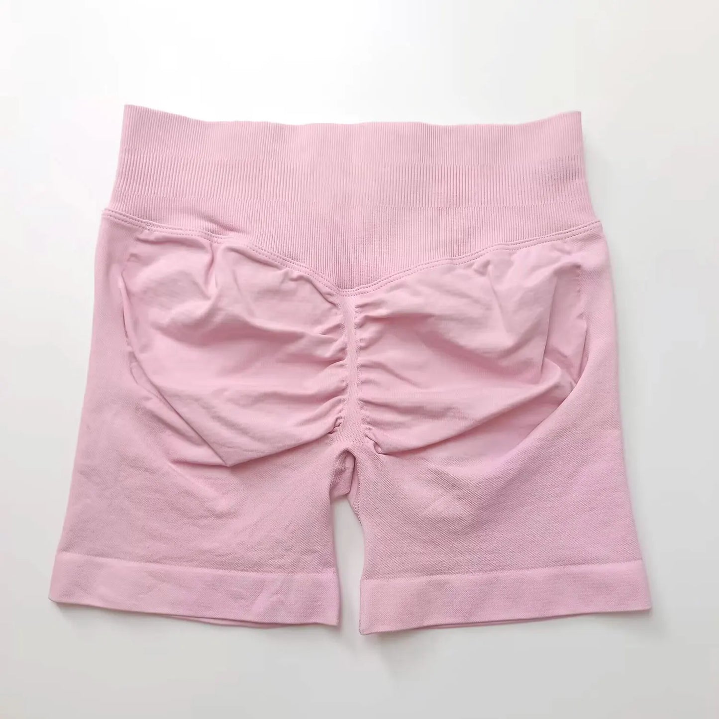 NCLAGEN seamless gym shorts for women, 4.5-inch length, scrunch butt design, suitable for running, yoga, and fitness workouts.