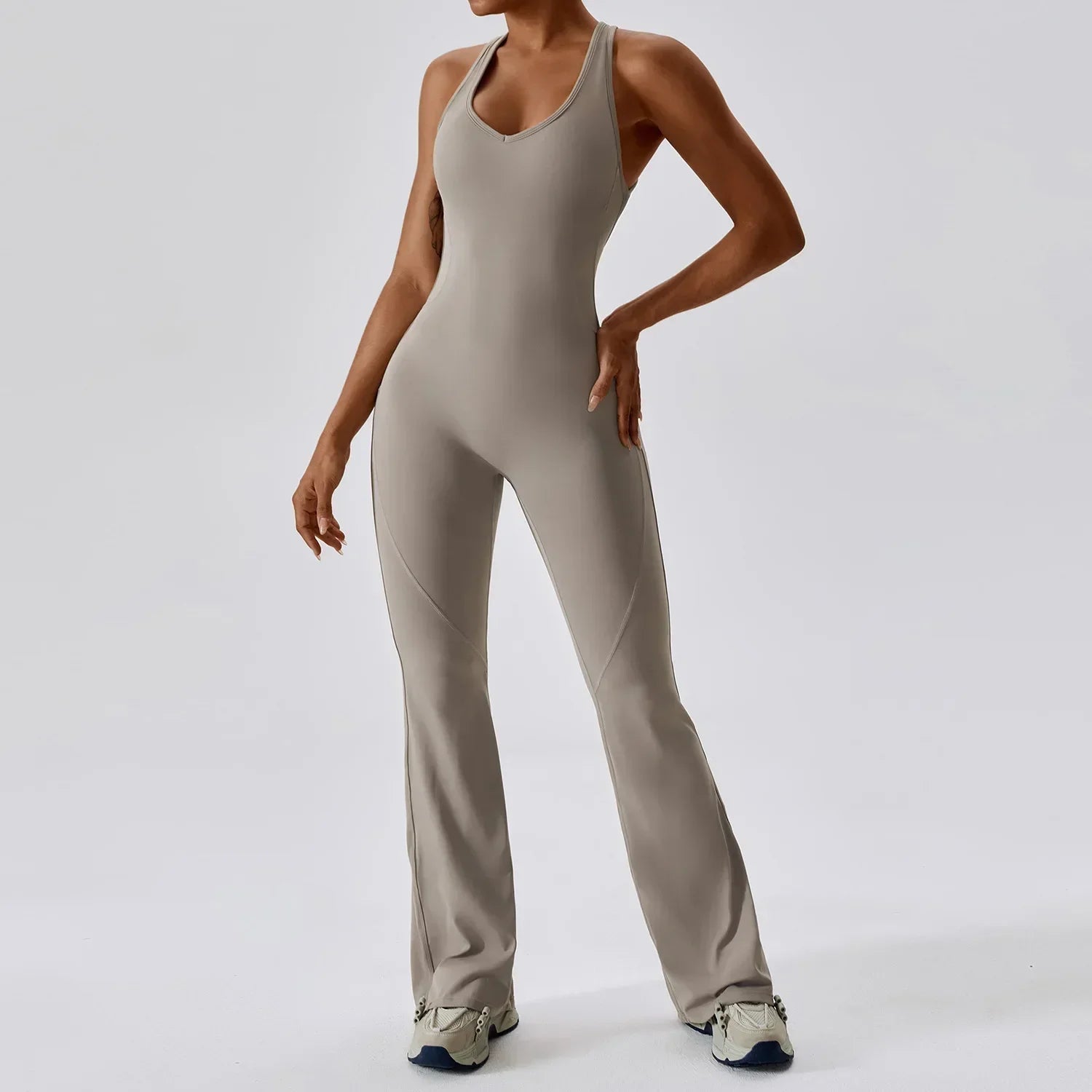Brown and khaki flared women's jumpsuit from GLWOW Store, fitness and yoga gym overalls with long sleeves and sporty design.