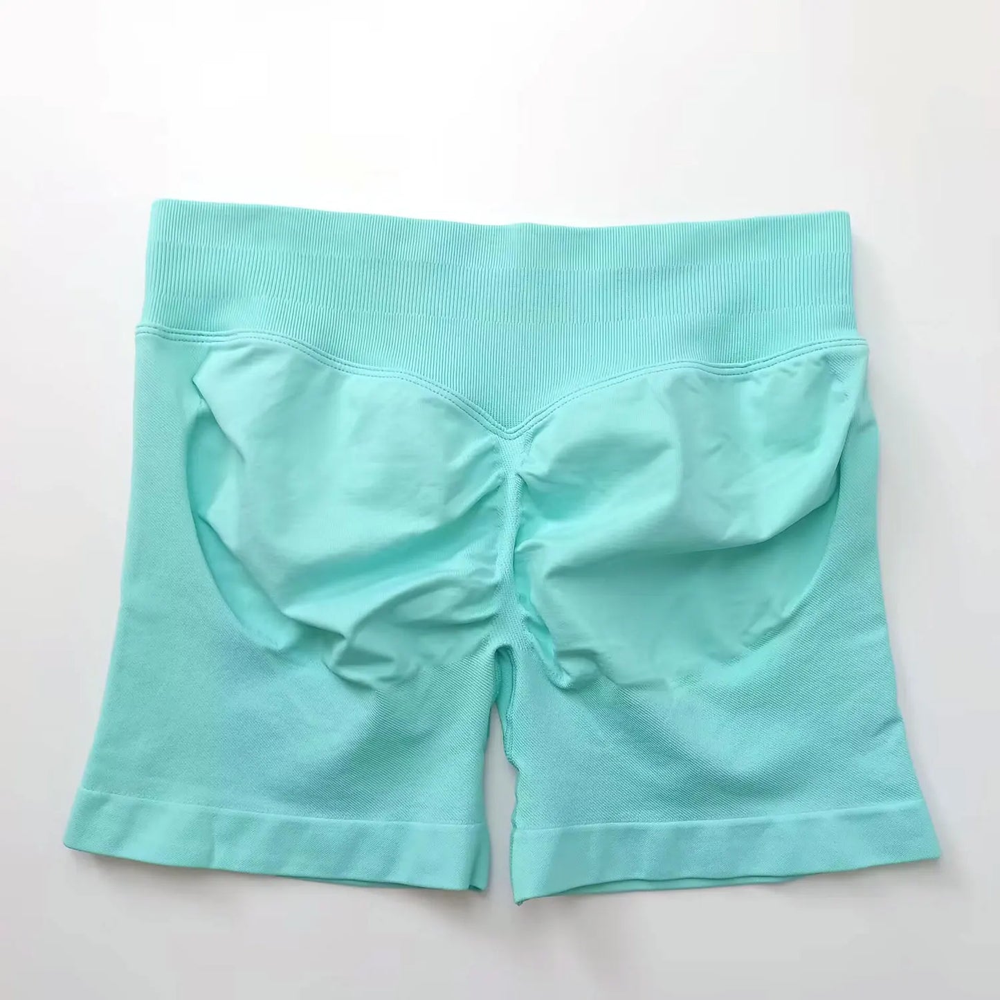 NCLAGEN seamless 4.5-inch gym shorts for women with scrunch butt design, suitable for running, yoga, and fitness workouts.