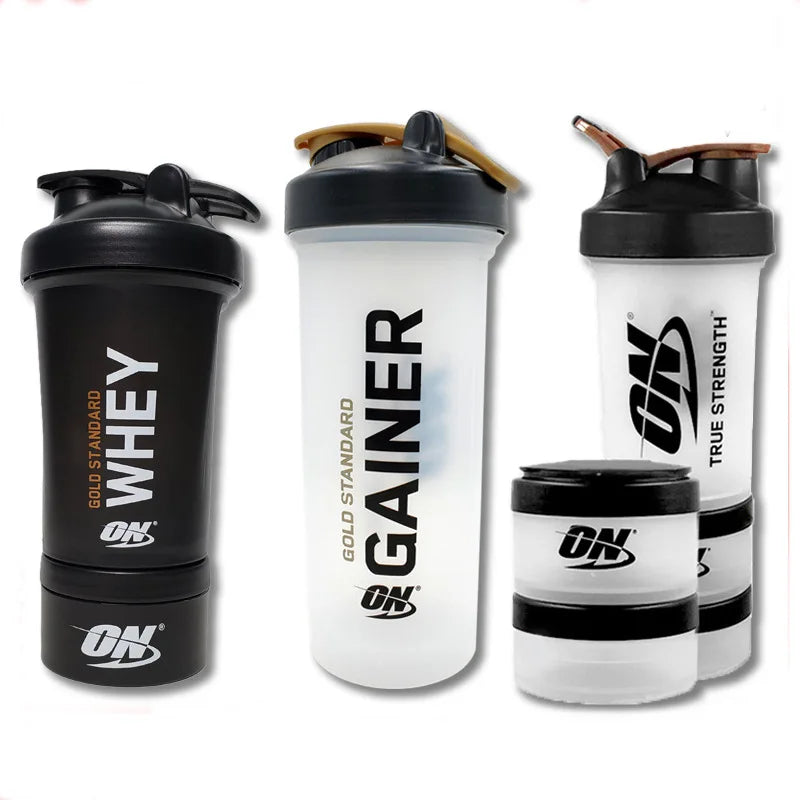 Large 450ML plastic protein shake cup with ball mixer and medicine box, ideal for fitness and protein powder drinks.