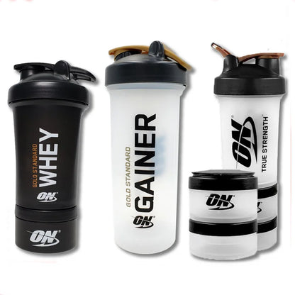 Large 450ML plastic protein shake cup with ball mixer and medicine box, ideal for fitness and protein powder drinks.