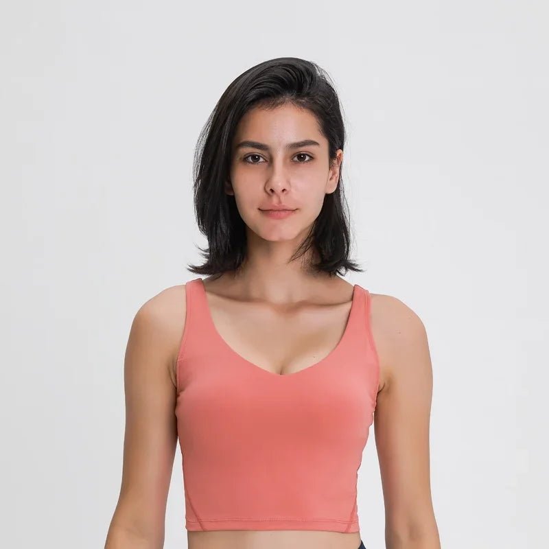 Nepoagym PASSION tank top with built-in shelf bra, removable padding, longline design, ideal for yoga and gym workouts.