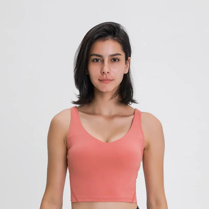 Nepoagym PASSION tank top with built-in shelf bra, removable padding, longline design, ideal for yoga and gym workouts.