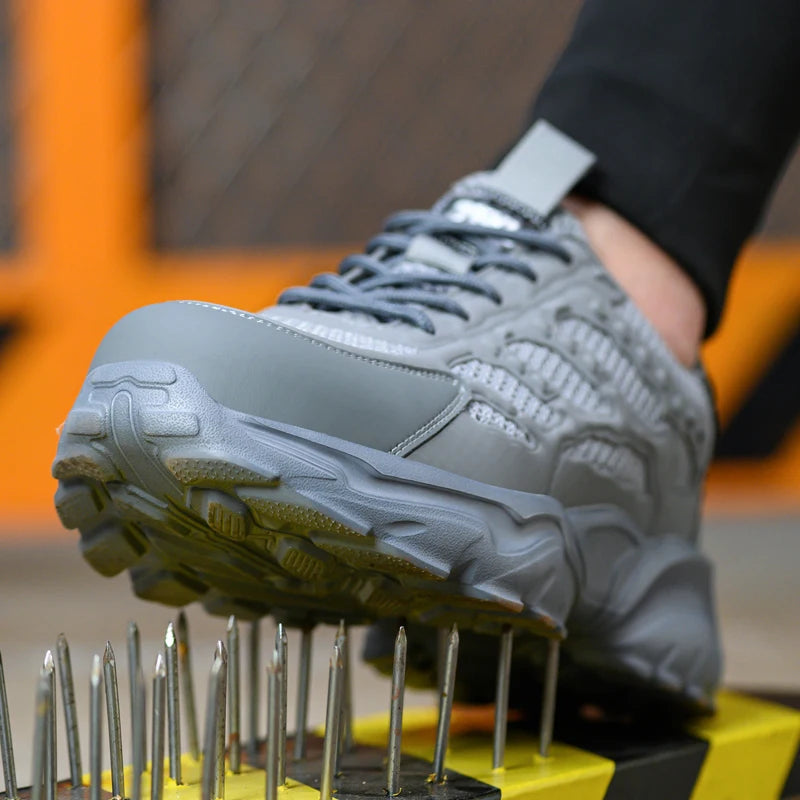 White breathable mesh safety shoes for men and women, lightweight protective work sneakers designed for summer durability.