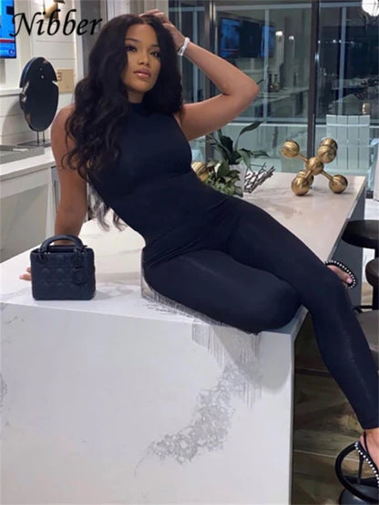 NIBBER summer black and white jumpsuit overalls for women, casual streetwear, stylish and comfortable activity outfit.