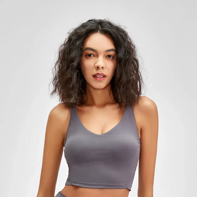 Nepoagym PASSION tank top with built-in shelf bra, removable padding, longline design, perfect for yoga and gym workouts.