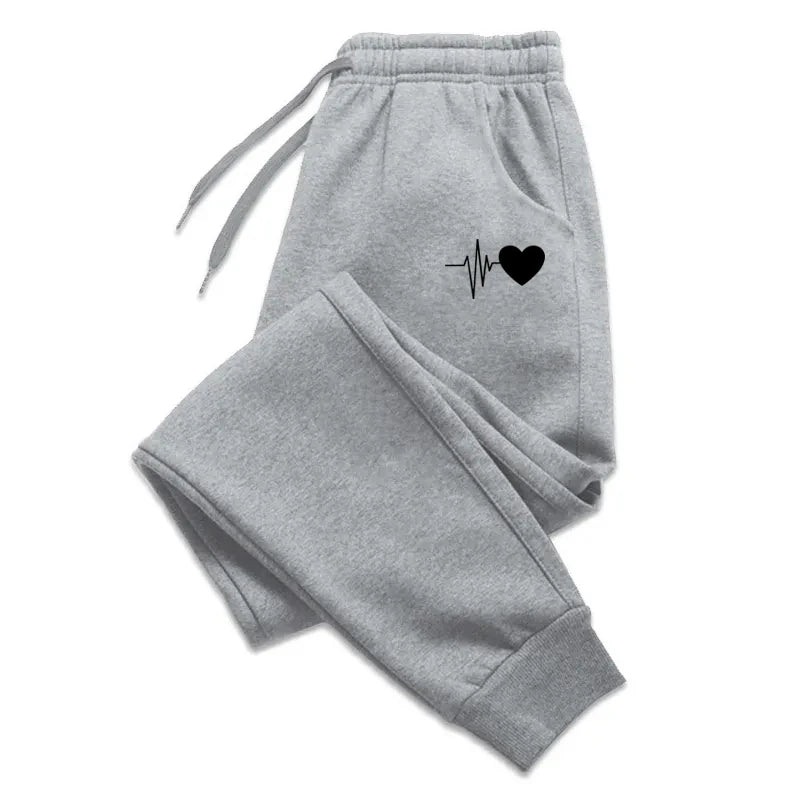 Women’s soft jogger pants with a relaxed fit, casual fitness sweatpants, comfortable baggy trousers for everyday wear.