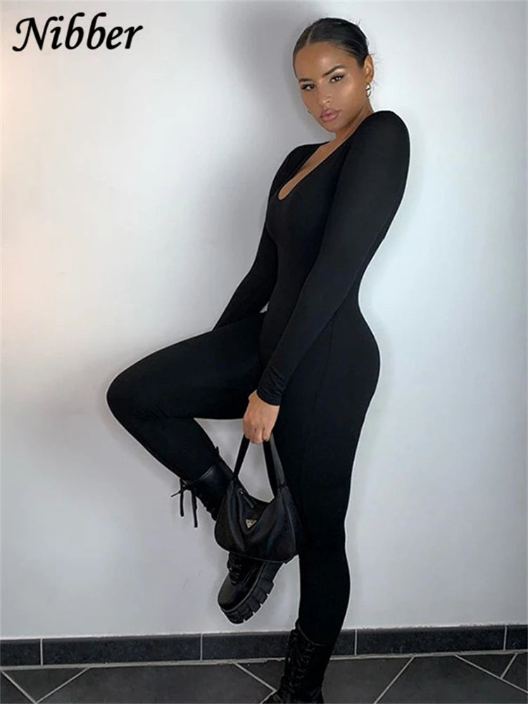 NIBBER Summer solid black and white jumpsuit for women, casual streetwear with sleeveless design and relaxed fit.
